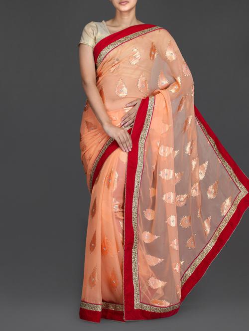 orange georgette saree with leaf motif - 1145648 - Very Small Image - 1