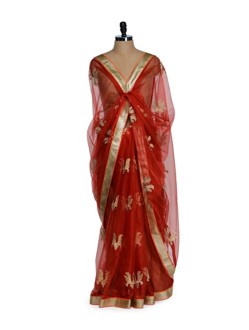 gorgeous red net saree with lotus motifs and golden blouse - 894030 - Very Small Image - 1