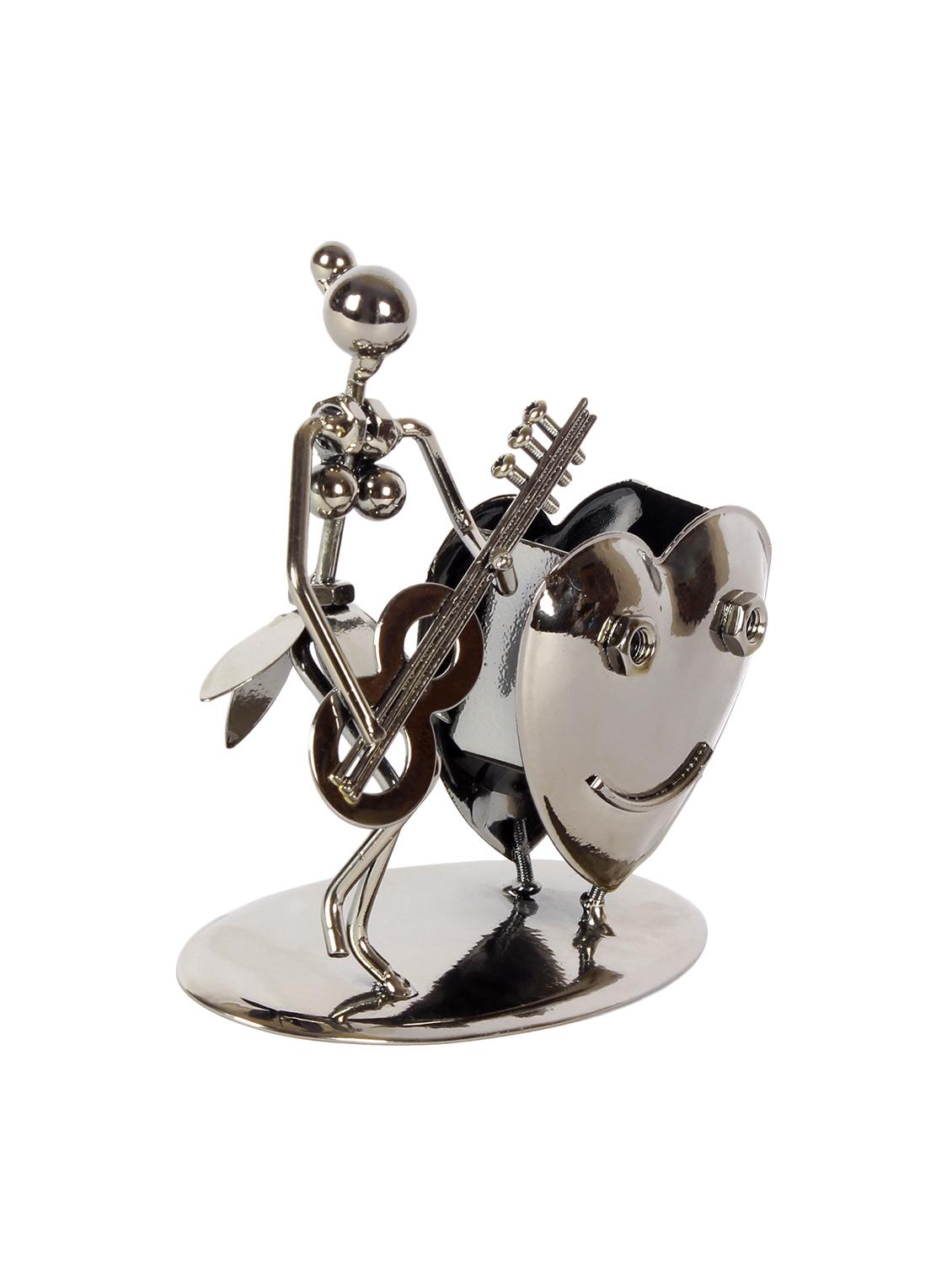 musician playing guitar and heart shaped pen stand - 13757600 - Zoom Image - 2