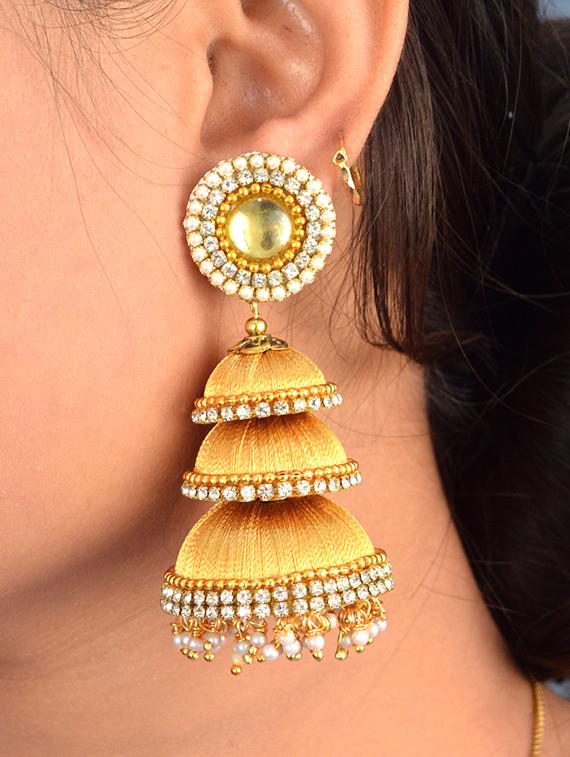 gold cotton blend jhumka earring