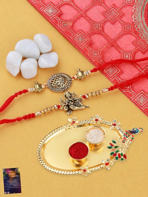 pack of 2 gold plated thread rakhi with roli chawal kankawati thali and greeting card  - 17900836 - Very Small Image - 1