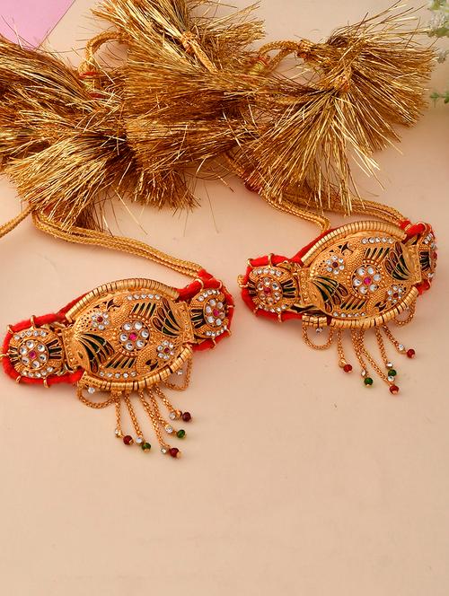 gold & red antique arm bracelet with a drawstring closure. - 18378476 - Standard Image - 0