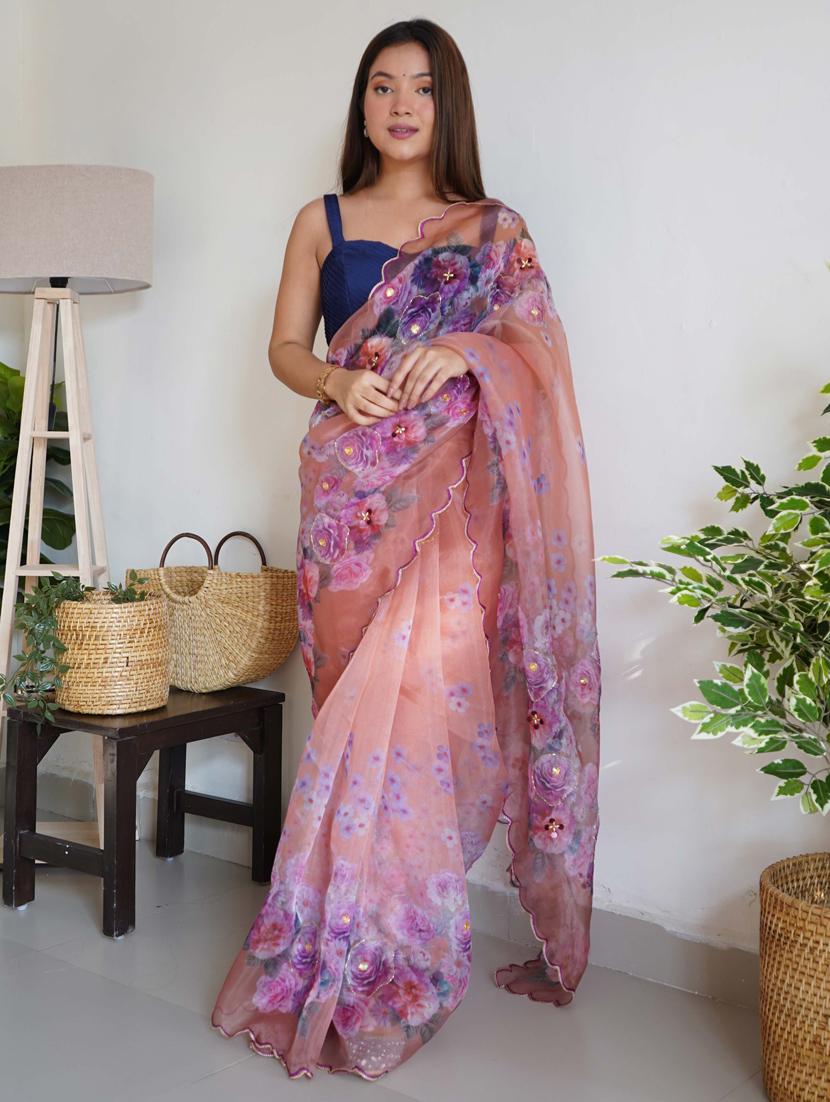 women peach floral printed saree